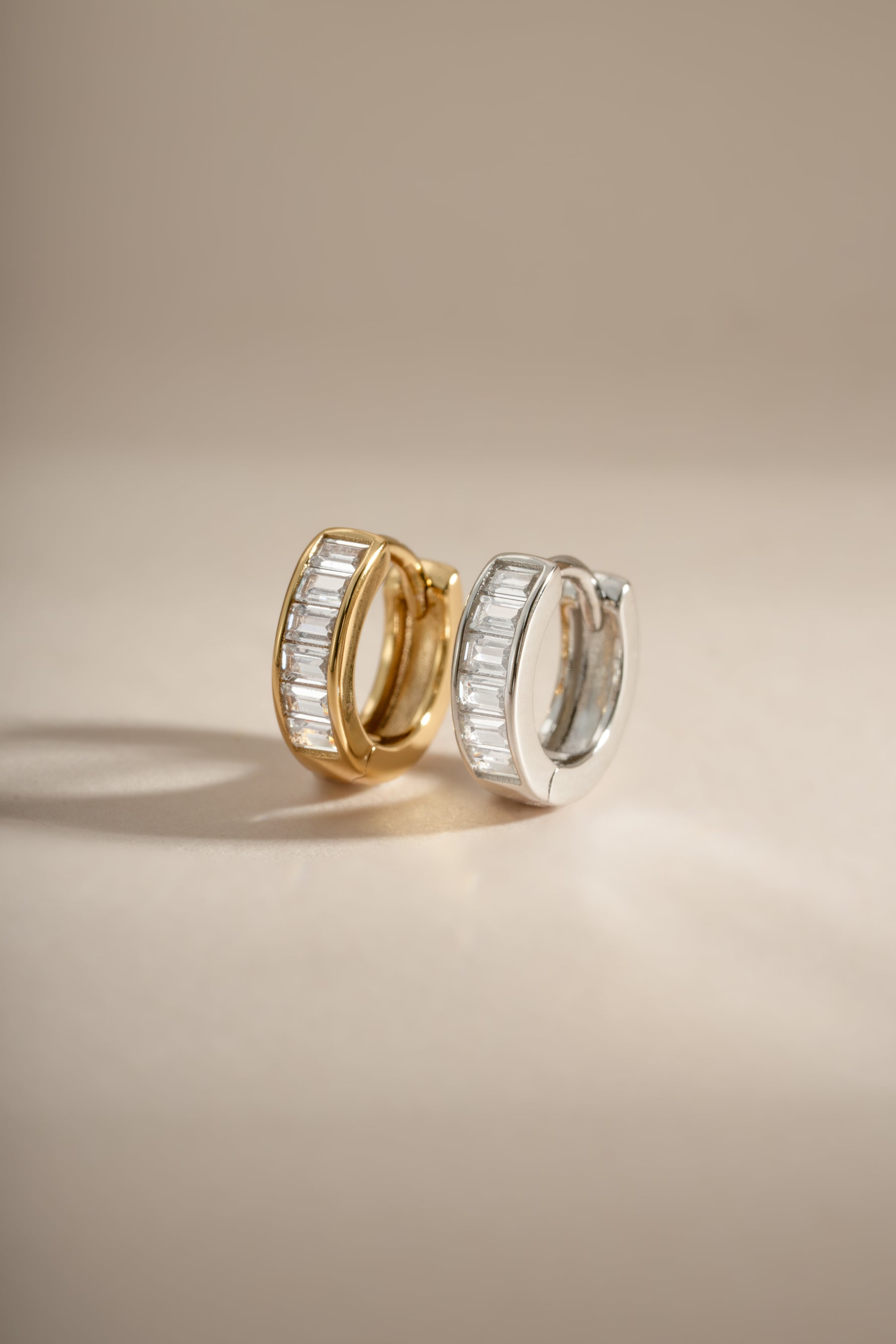 Gold and sterling silver Small Baguette Huggies earrings by Sami Jewels featuring sleek baguette-cut design.