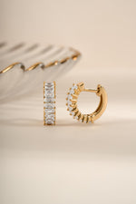 Gold Daryl-Ann's Baguette Hoops earrings by Sami Jewels featuring sleek baguette-shaped huggie hoop design
