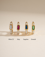 Sami Jewels Ruby Baguette Huggie Earrings with sparkling gemstone accents and sleek hoop design.