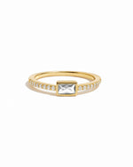Baguette Ring w Pavé Band in gold on a white background