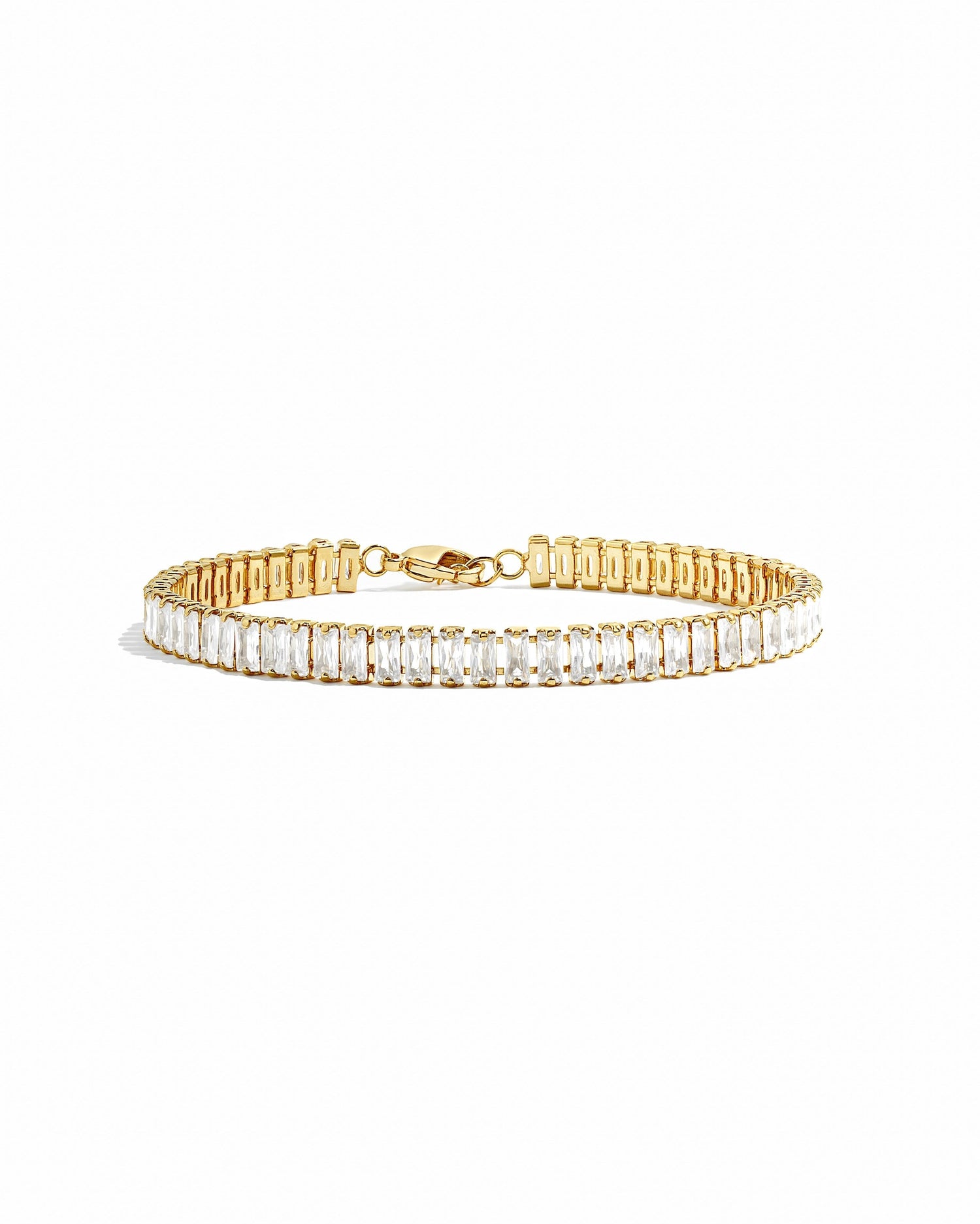 Gold Baguette Tennis Bracelet by Sami Jewels, showcasing rectangular-cut stones on a delicate bracelet.