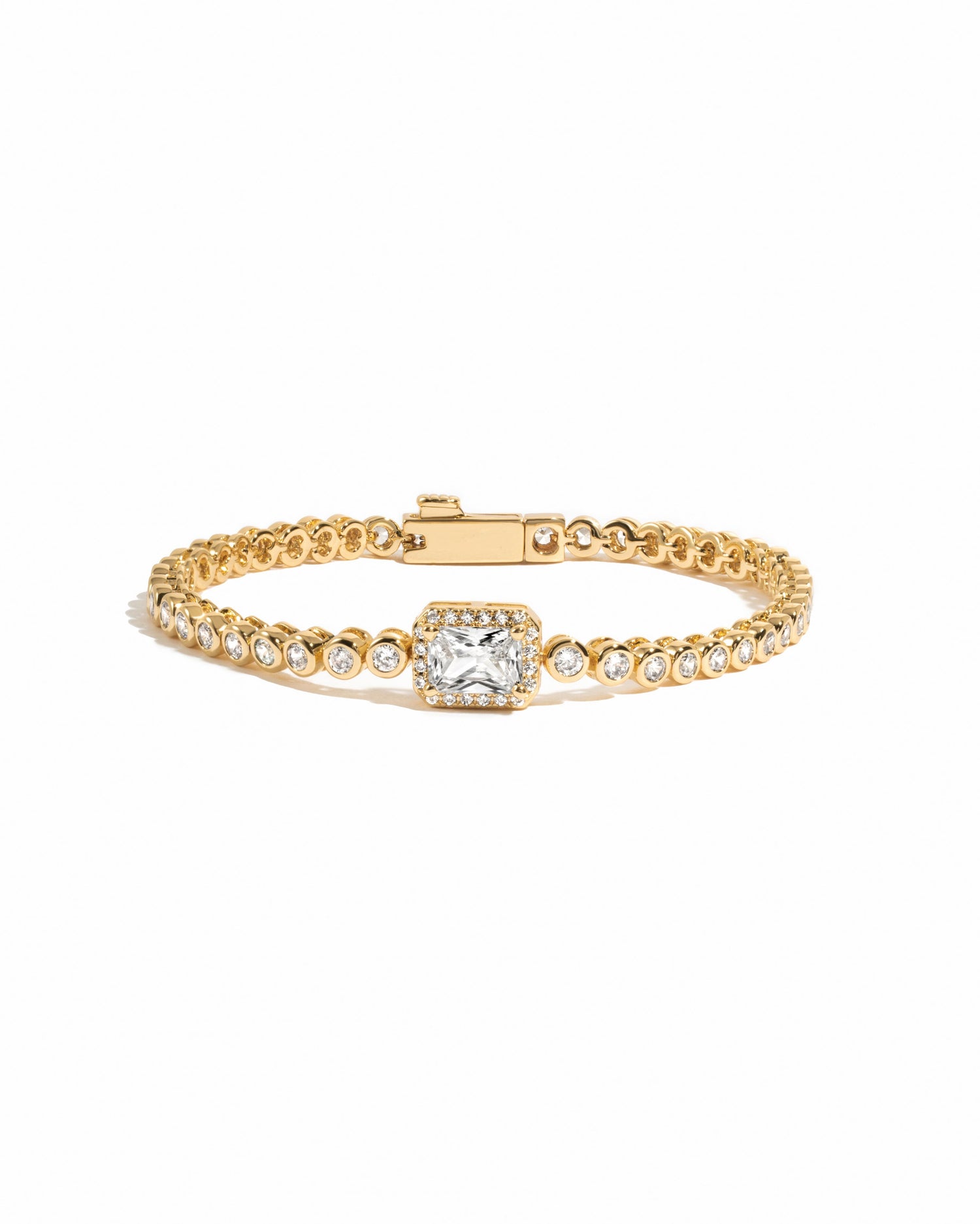 Gold CZ baguette rounded tennis bracelet by Sami Jewels, featuring sparkling baguette-cut stones on a sleek bracelet design.