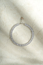 Silver Baguette Tennis Bracelet by Sami Jewels featuring rectangular cut gemstones in a sleek, elegant design.