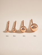 Rose gold 4mm ball stud earrings by Sami Jewels featuring sleek, minimalist spherical design for everyday wear.