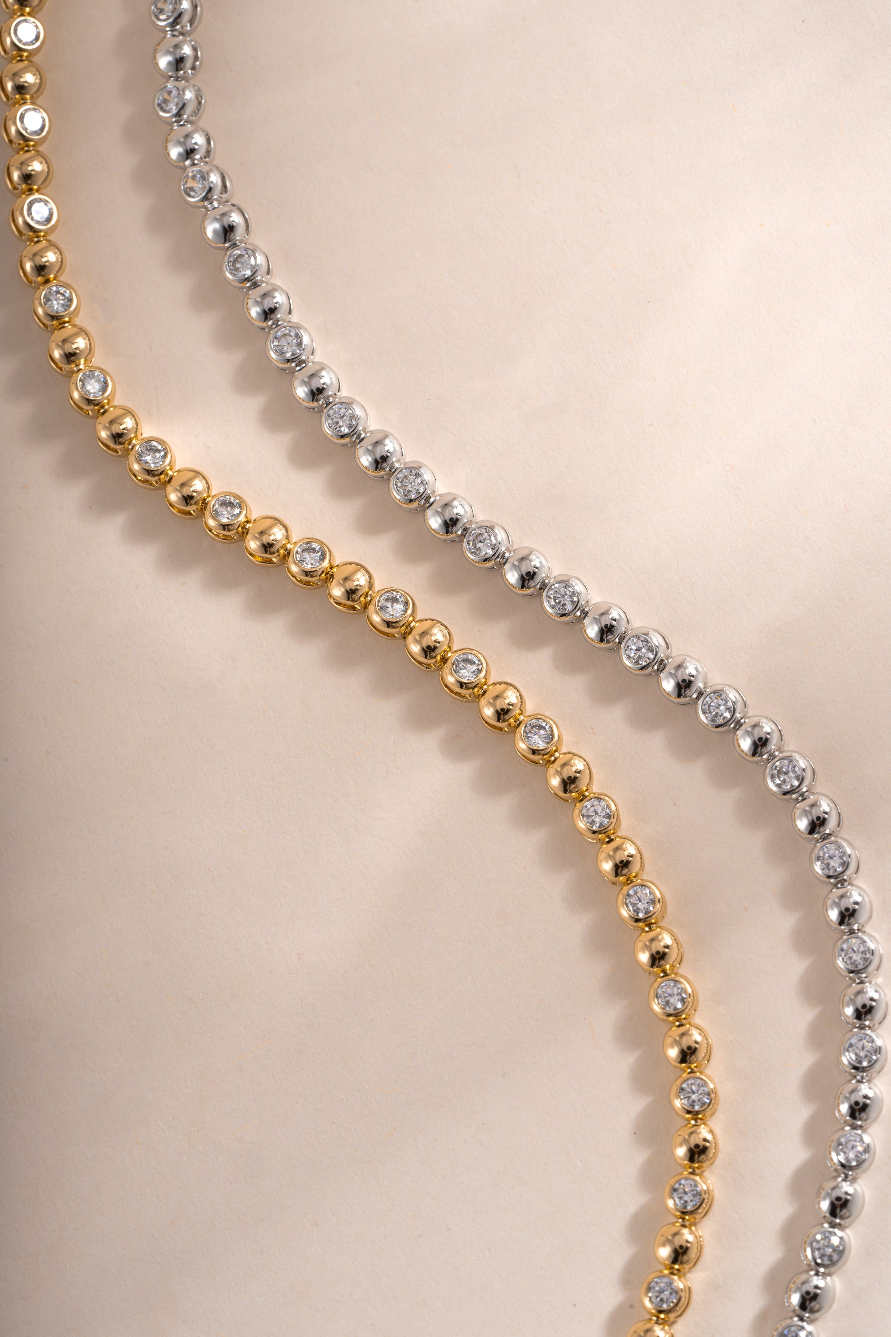 Gold and sterling silver Bead & Bezel Tennis Bracelet by Sami Jewels featuring sparkling beads and bezel settings.
