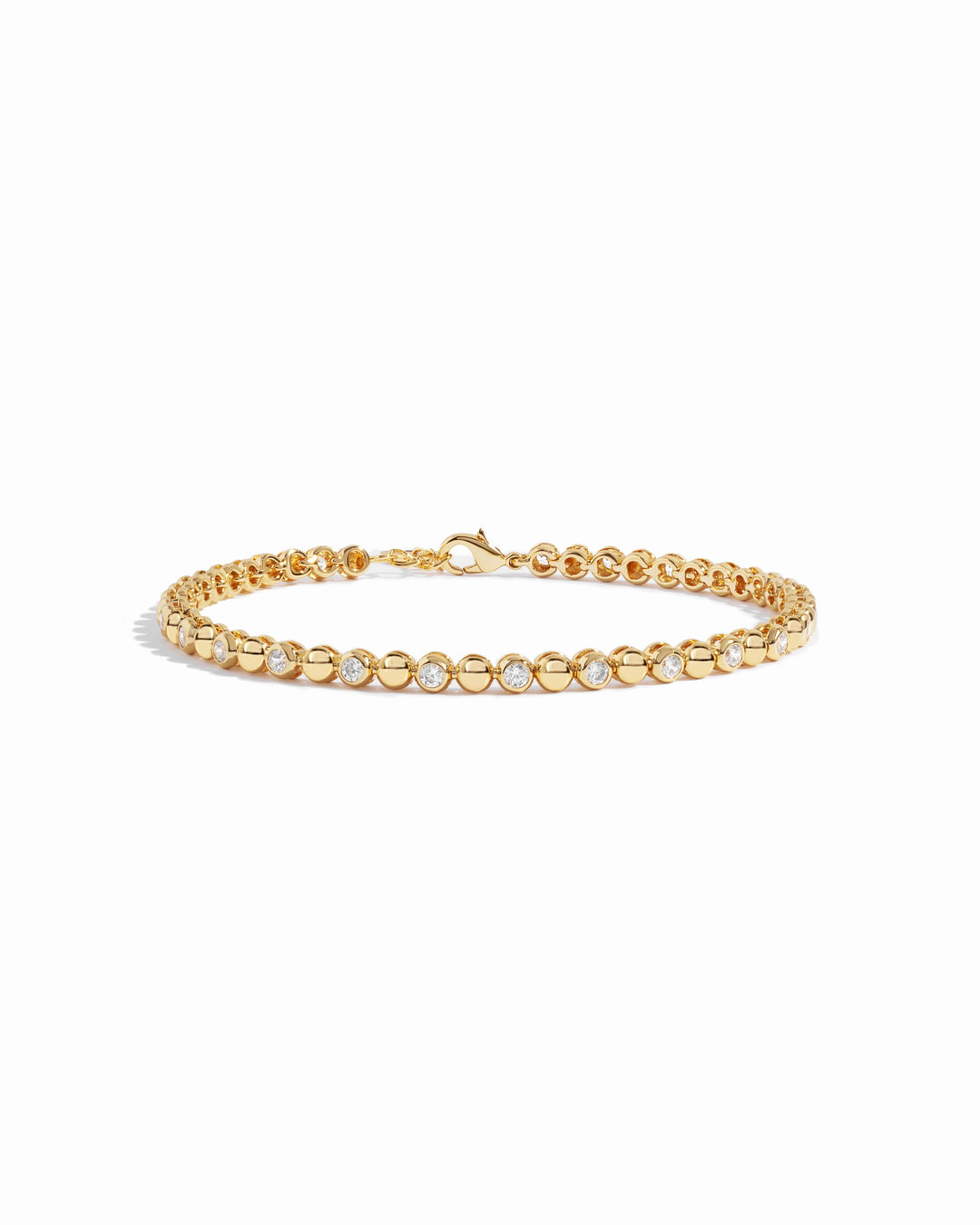 Gold Bead & Bezel Tennis Bracelet by Sami Jewels displayed on a white background, showcasing its elegant design and craftsmanship.