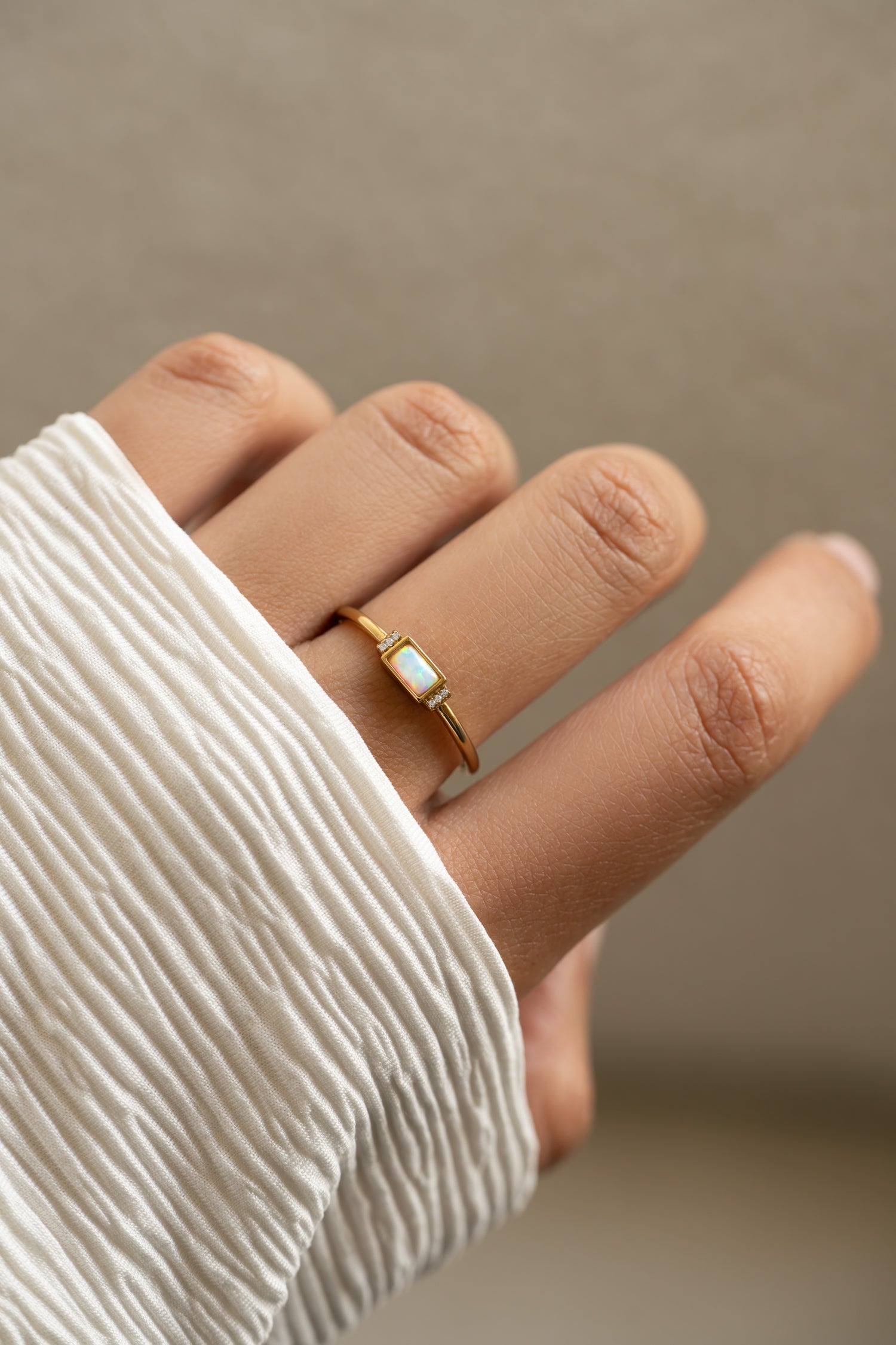 Gold Bezel Baguette Opal Ring by Sami Jewels featuring a bezel-set baguette-shaped opal on a sleek gold band