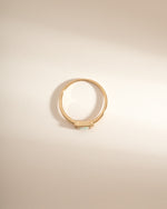Gold bezel Baguette Opal Ring by Sami Jewels, top view showcasing the rectangular opal gemstone set in a sleek gold band.