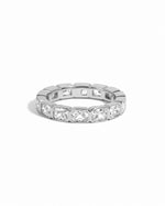Sterling silver bezel emerald cut eternity ring from Sami Jewels with a sleek, modern design on a white background.