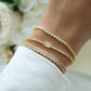 Layered Stack of Tennis Bracelets Bezeled Emerald-Cut Charm Tennis Bracelet - Sami Jewels