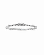 Silver Bezeled Baguette Tennis Bracelet by Sami Jewels with a row of sparkling baguette-cut stones on a white background.