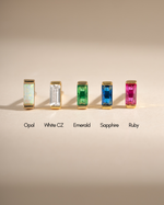 White cubic zirconia baguette stud earrings by Sami Jewels, showcasing elegant jewelry with sparkling gemstone details.