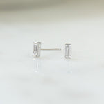 closeup image of small earrings in sterling silver