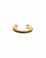 Gold CZ Ear Cuff earrings by Sami Jewels on a white background, showcasing a stylish black CZ design.