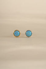 Blue opal stud earrings by Sami Jewels featuring gold and sterling silver settings.