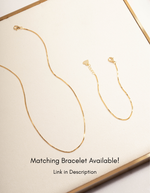 Gold box chain necklace and bracelet from Sami Jewels, featuring sleek, interconnected square links for a modern jewelry look.