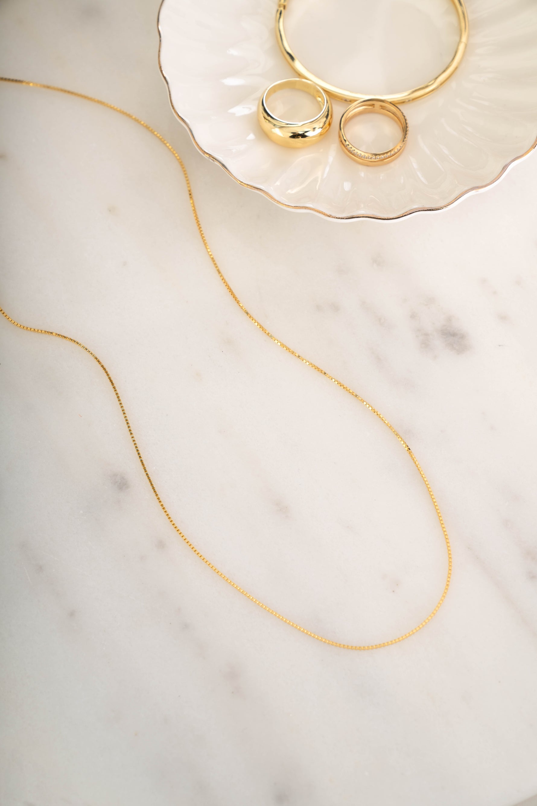 Gold box chain necklace from Sami Jewels, featuring a sleek, square-link design for a stylish and versatile accessory.