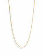 Gold box chain necklace from Sami Jewels displayed on a white background, showcasing its sleek and elegant design.