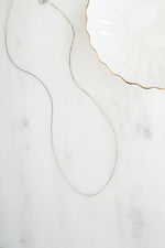Sterling silver Box Chain Necklace by Sami Jewels showcasing a sleek, polished box chain design on a plain background.
