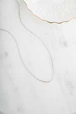Sterling silver box chain necklace from Sami Jewels, featuring a sleek and modern design with a smooth, polished finish.