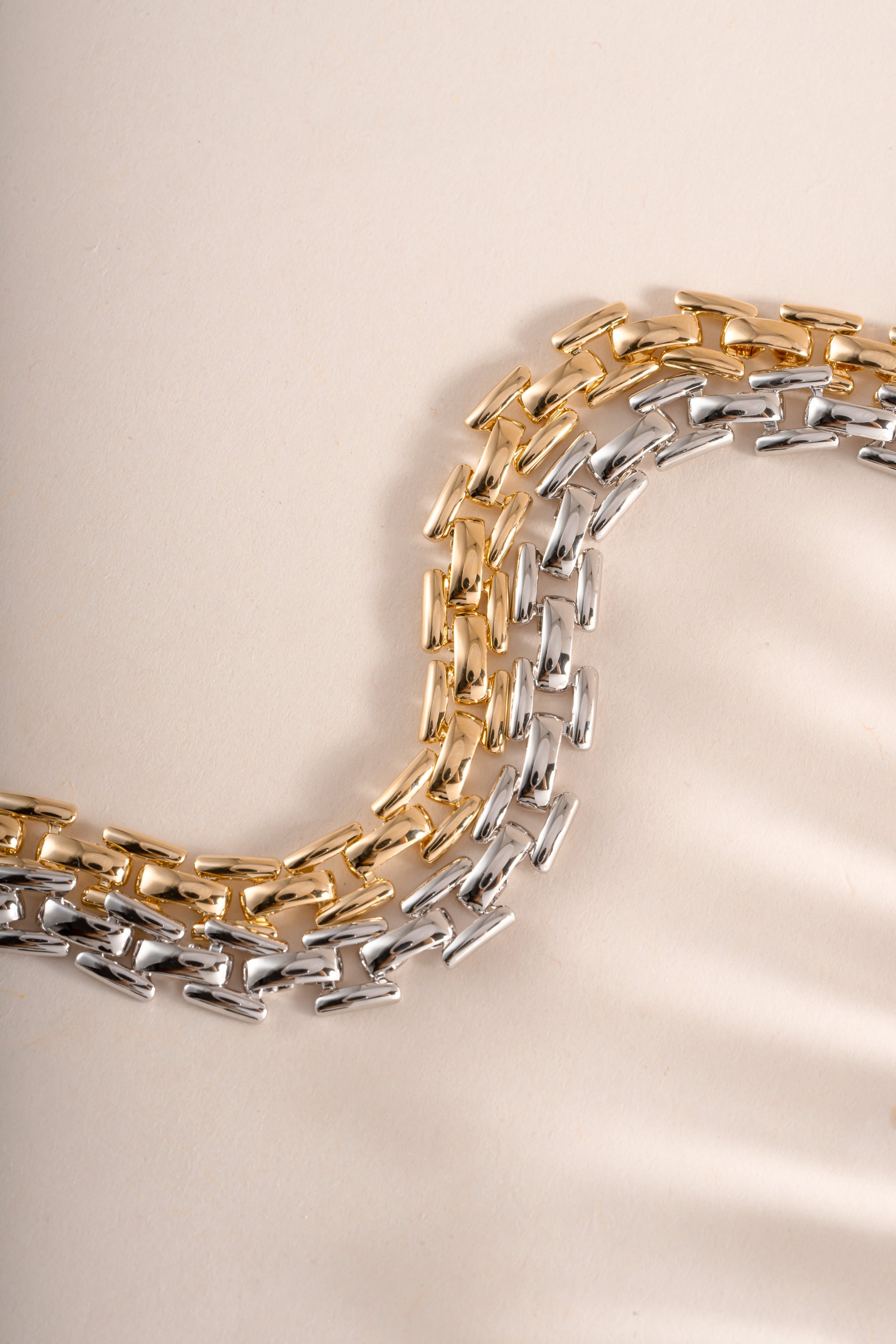 Gold and sterling silver Jasmine Link bracelet with chain-link design by Sami Jewels.