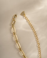 Gold chain link necklace with lobster clasp closure from Sami Jewels, showcasing a stylish and durable jewelry piece.