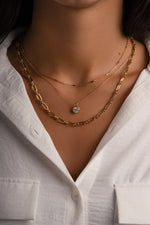Gold chain link necklace styled on a model, showcasing Sami Jewels' elegant jewelry design.