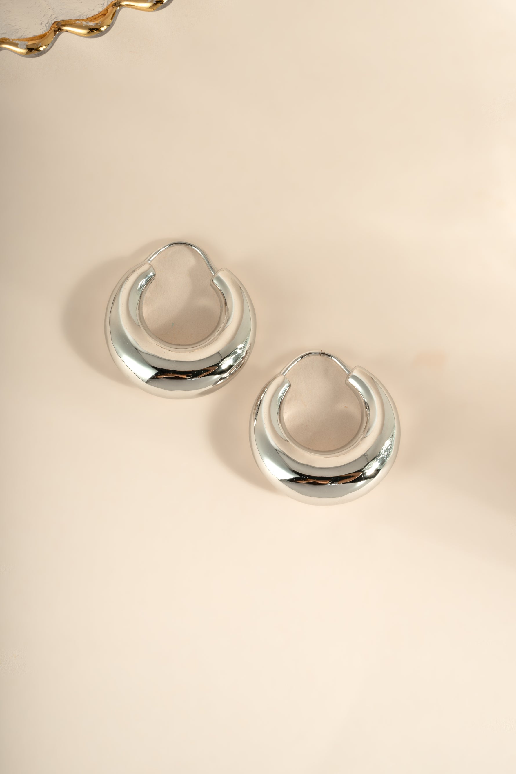Sami Jewels chunky basket hoop earrings with sterling silver posts, featuring bold, textured metal design for a stylish look.