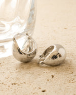 Sterling silver Chunky Basket Tube Hoop Earrings by Sami Jewels with post back design and bold, textured hoop style.