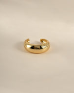 Gold Sami Jewels chunky ear cuff earring, stylish and bold accessory for pierced ears, featuring a chunky design and modern aesthetic.