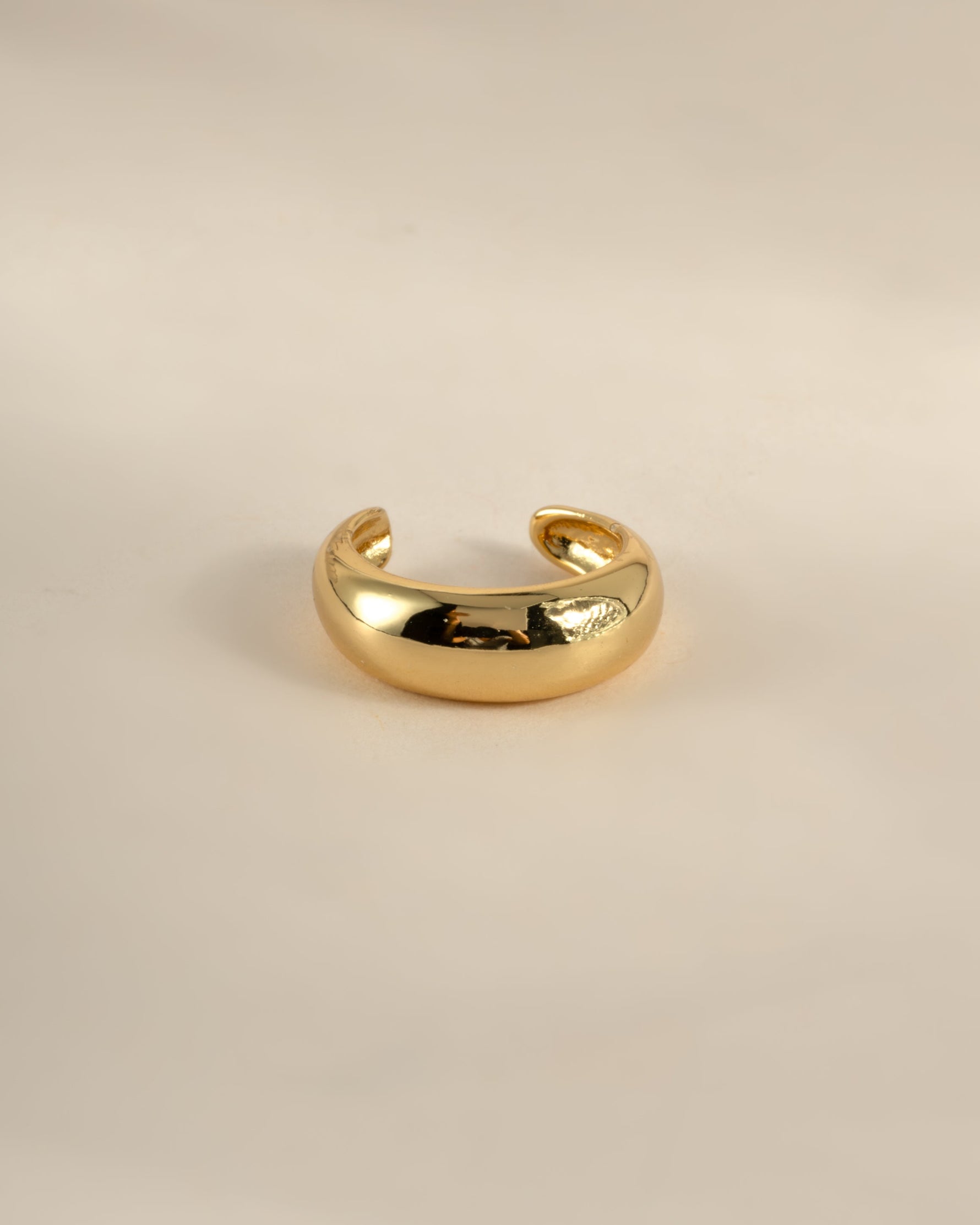 Gold Sami Jewels chunky ear cuff earring, stylish and bold accessory for pierced ears, featuring a chunky design and modern aesthetic.