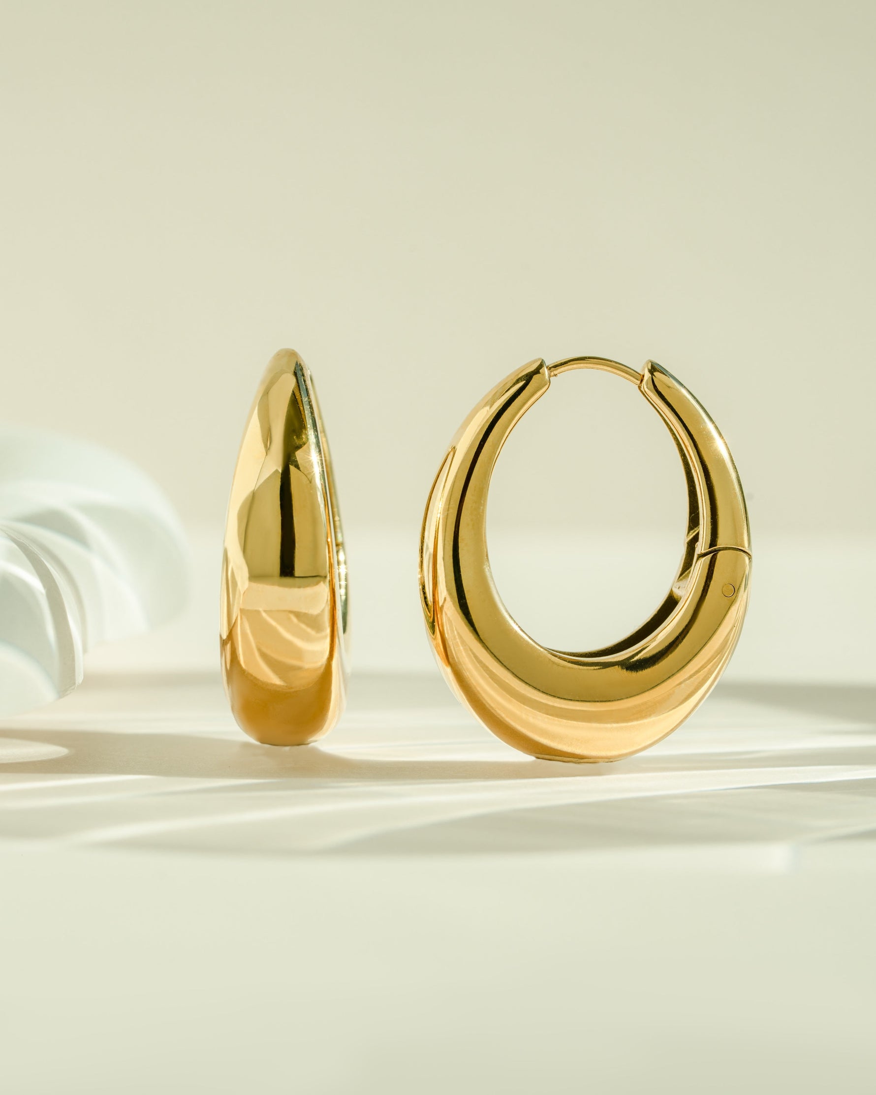 Close-up of Sami Jewels SS Basket Hoops earrings, chunky gold stainless-steel hoop earrings with a waterproof finish.