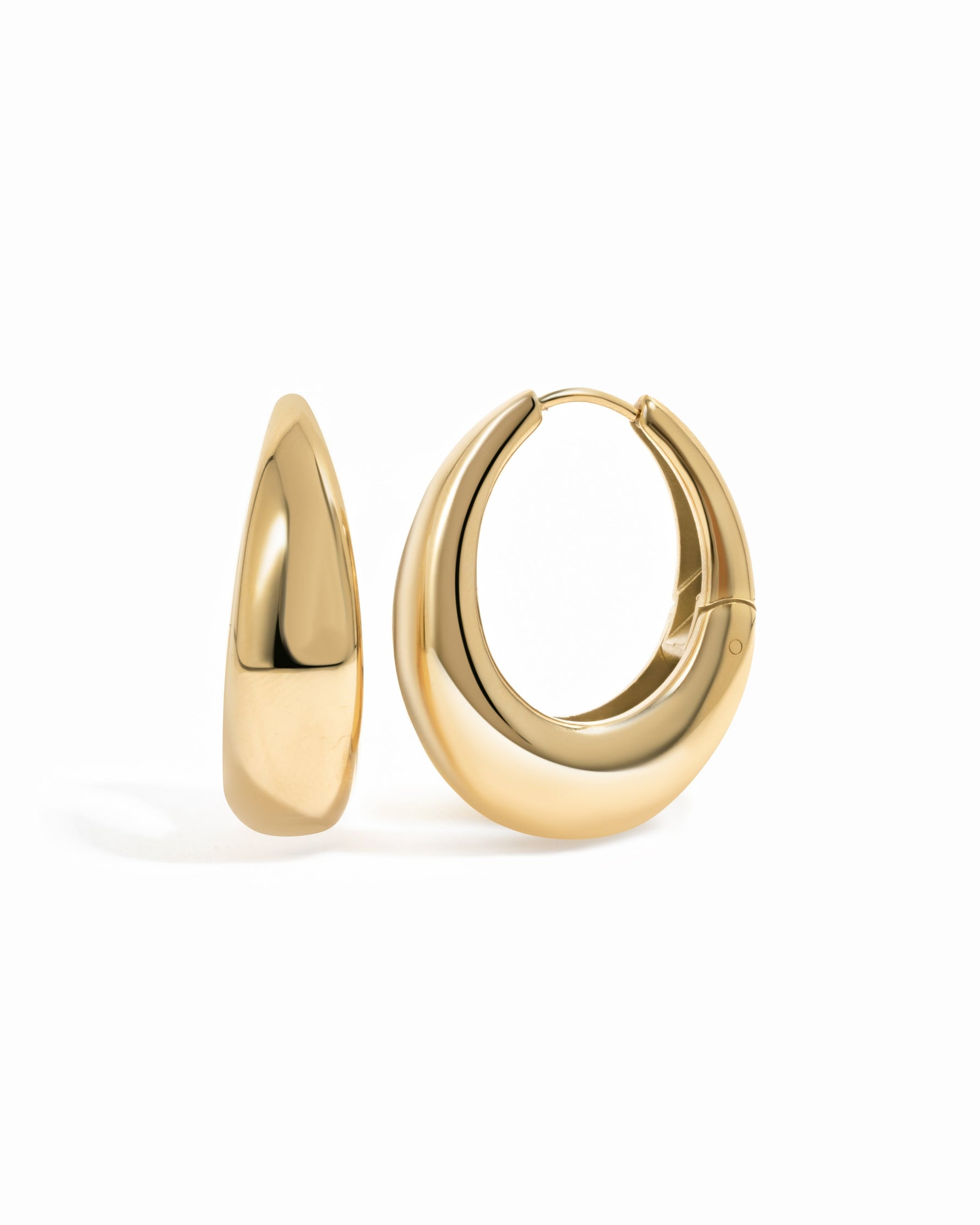 Close-up of chunky stainless steel gold SS Basket Hoop Earrings by Sami Jewels, showcasing their shiny, waterproof design.