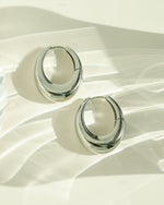 Sami Jewels stainless steel SS basket hoop earrings in silver, chunky waterproof hoop earrings with a modern design.