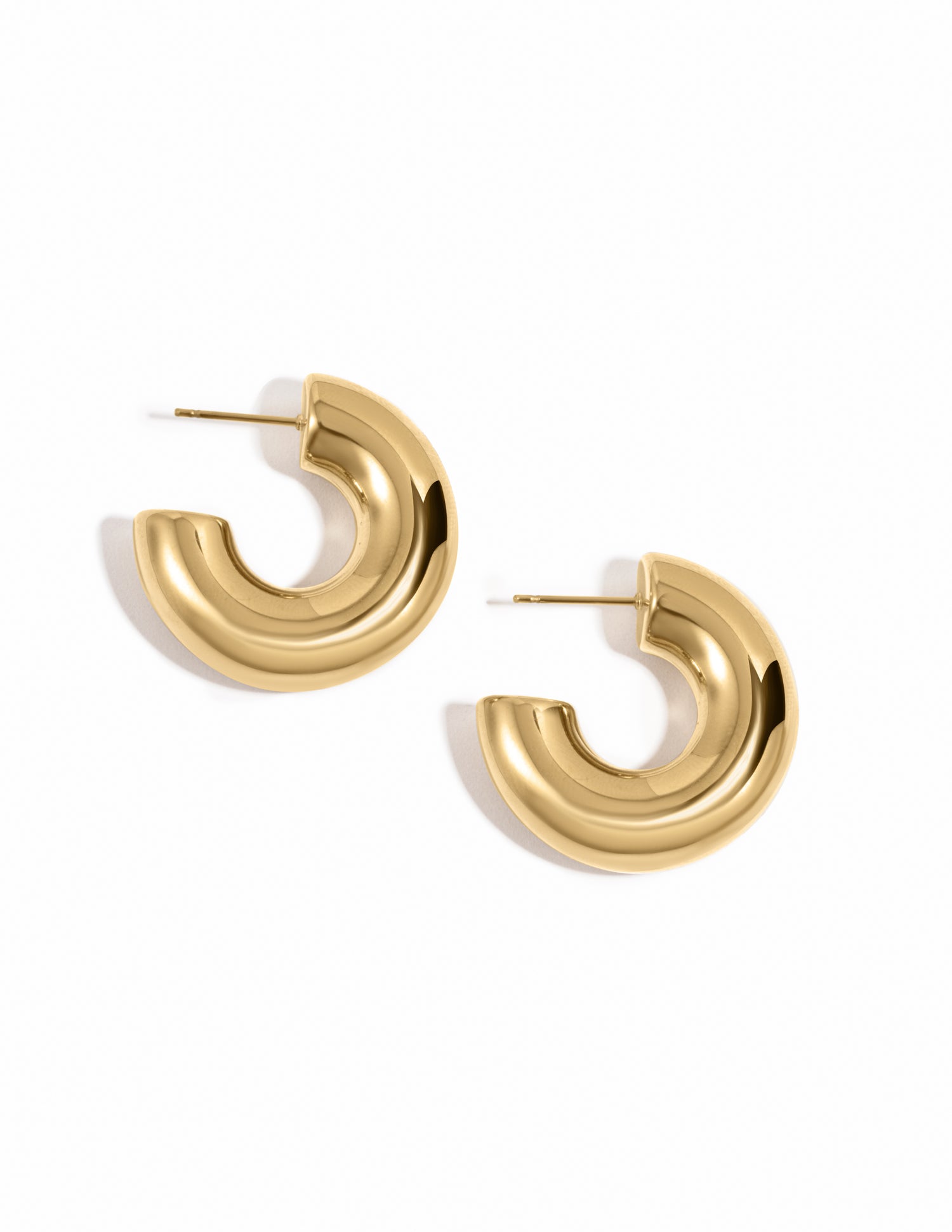 Gold stainless steel SS tube hoops earrings with chunky open design, waterproof jewelry by Sami Jewels.