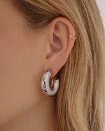 Silver stainless steel SS tube hoops earrings with a chunky open design by Sami Jewels, waterproof and stylish.
