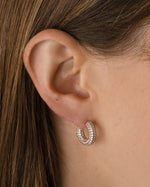 Rose gold chunky pavé hoop earrings by Sami Jewels, featuring sparkling pave setting and bold hoop design.