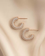 Rose gold chunky pavé hoop earrings by Sami Jewels, showing a close-up profile view with sparkling pavé detailing.