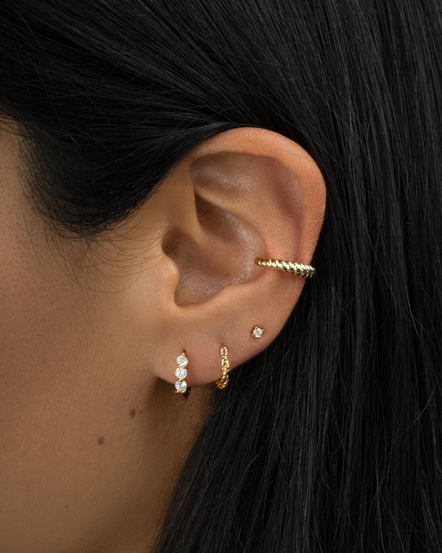 Gold croissant ear cuff earring worn on model showcasing its unique design and elegant style by Samijewels-527.