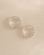 Sami Jewels Jacky Hoop Earrings in sterling silver, croissant-shaped hoop earrings shown in side profile view