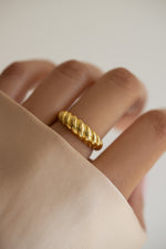 Gold Croissant Ring by Sami Jewels featuring a detailed, textured design on a sleek ring band.