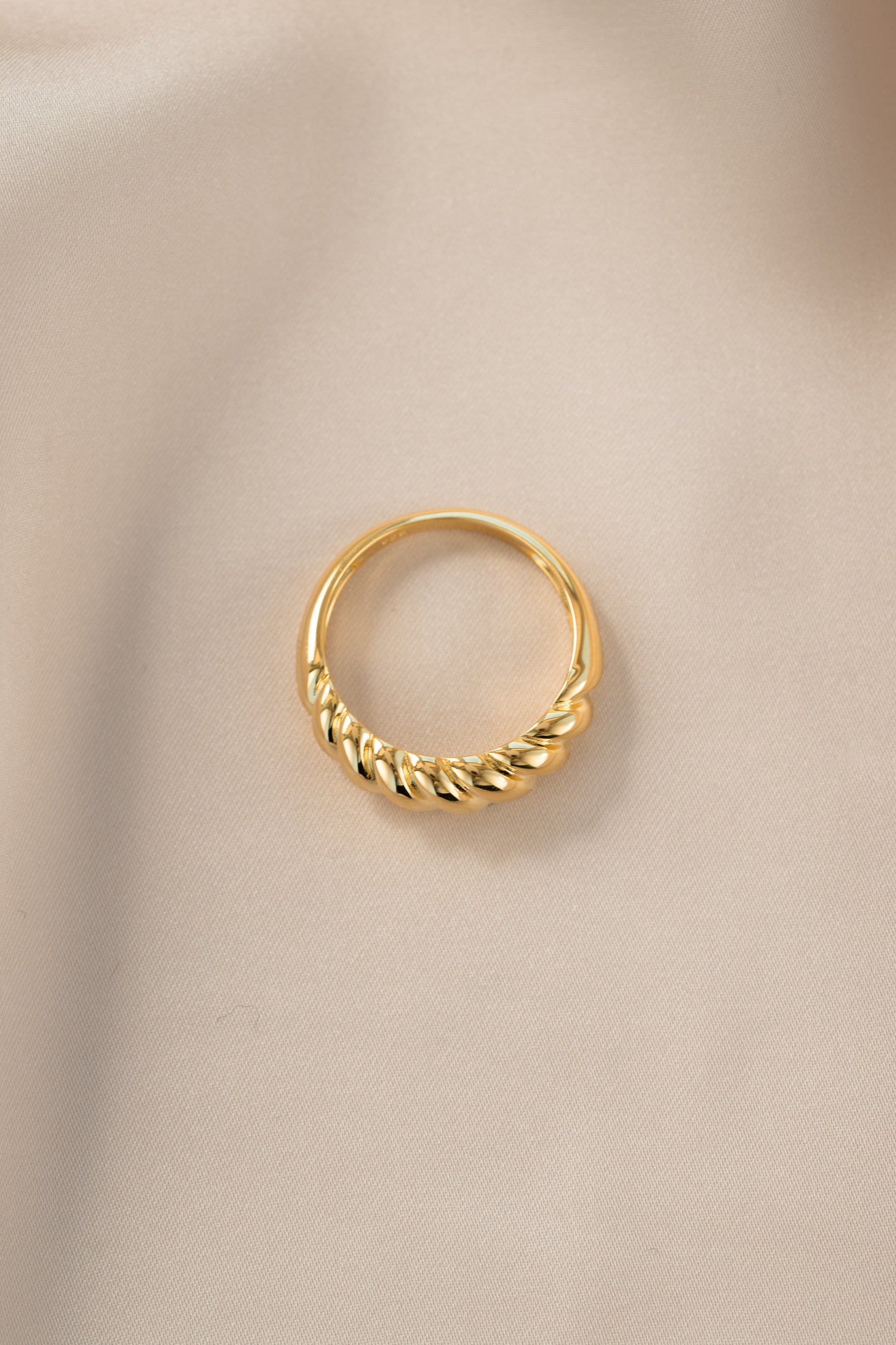 Gold Croissant Ring by Sami Jewels, top view showcasing a detailed, textured croissant design on a sleek gold band.