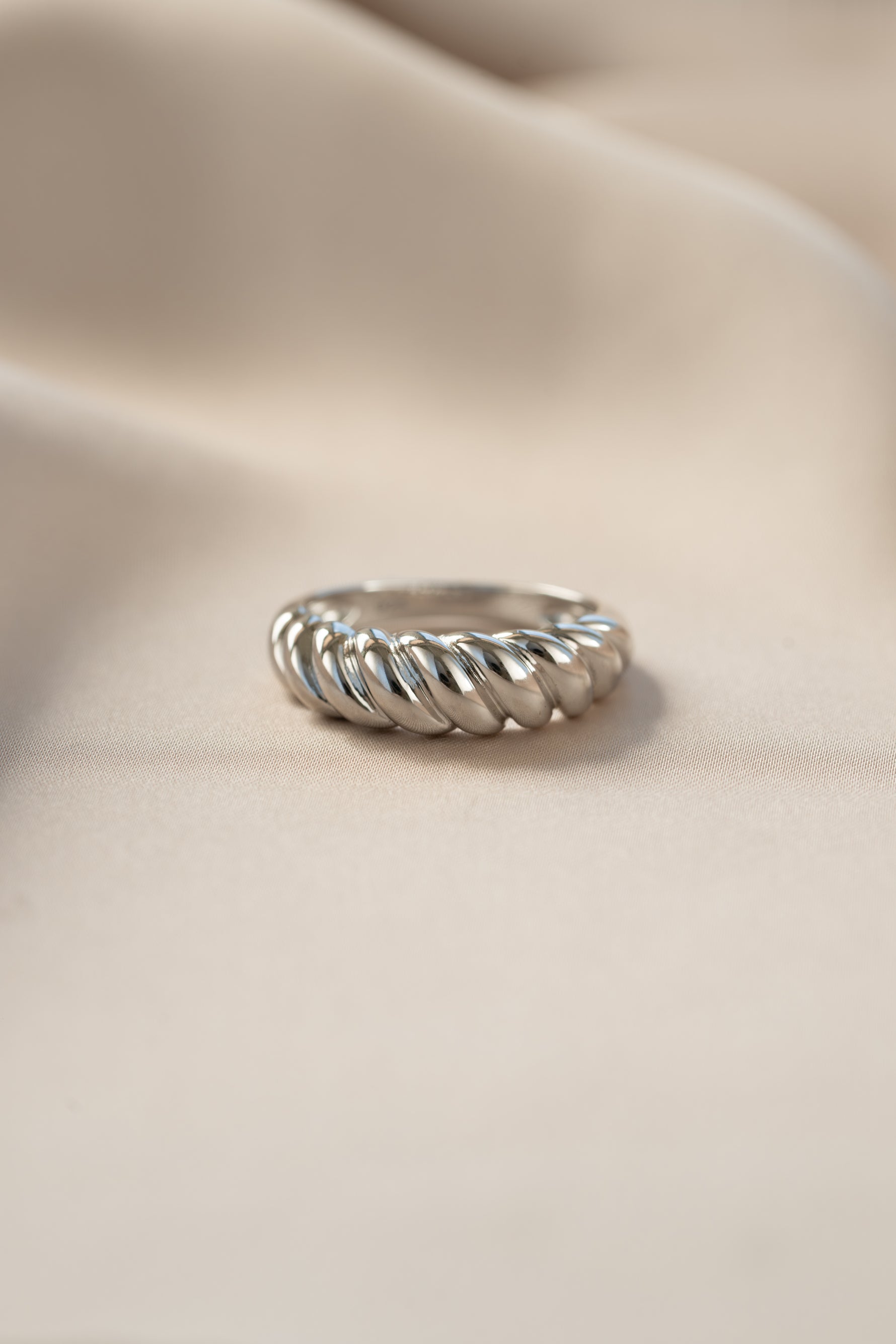 Sterling silver Croissant Ring by Sami Jewels featuring a detailed croissant design in a stylish ring shape.