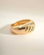 Gold large croissant statement ring from Sami Jewels, side view showing detailed croissant design on a sleek ring band.