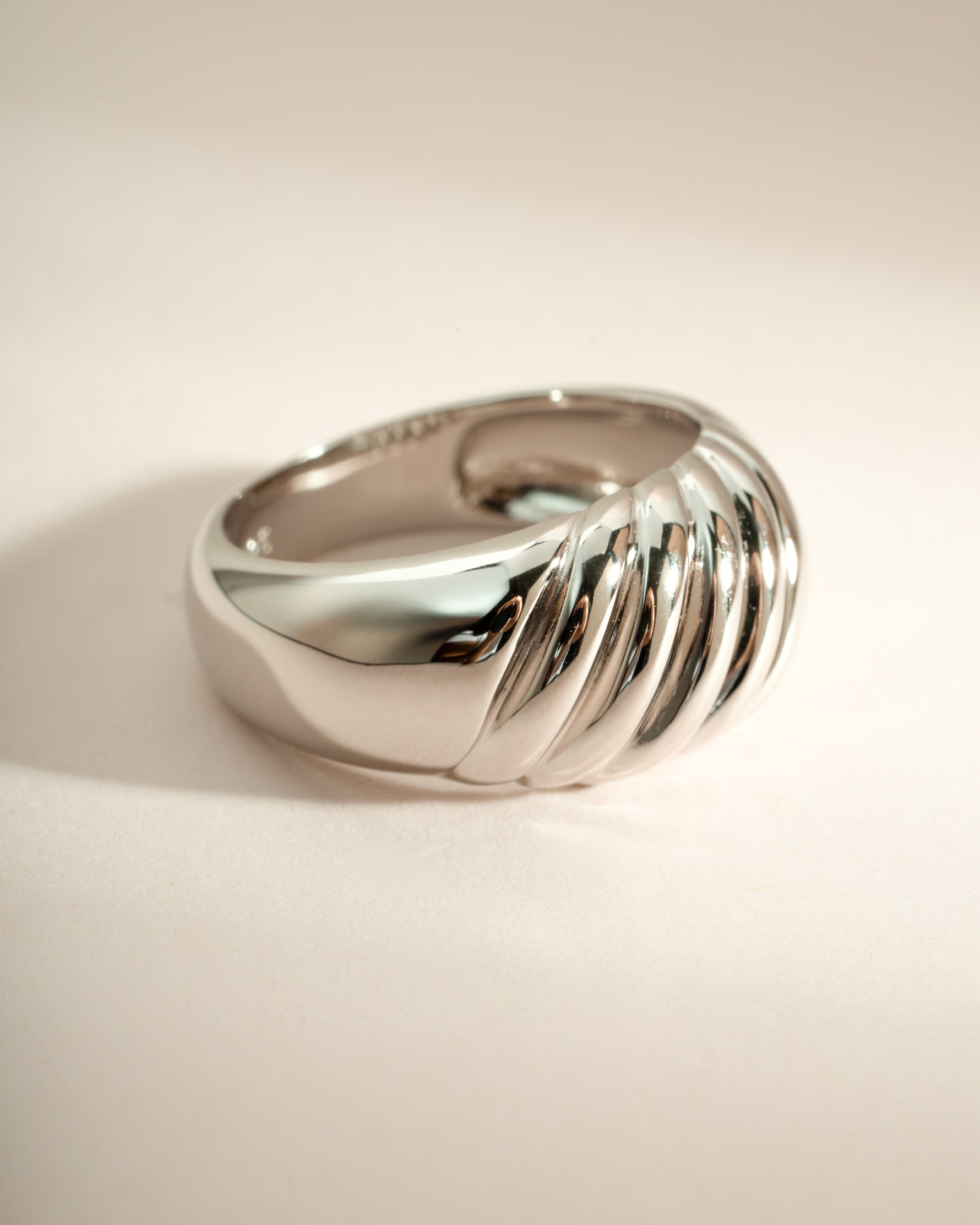 Sterling silver large croissant ring by Sami Jewels, side view showcasing its detailed, statement design and textured finish.