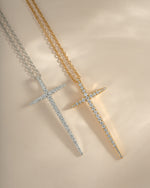 Gold and sterling silver cross necklace from Sami Jewels with a sleek, elegant design perfect for everyday wear.