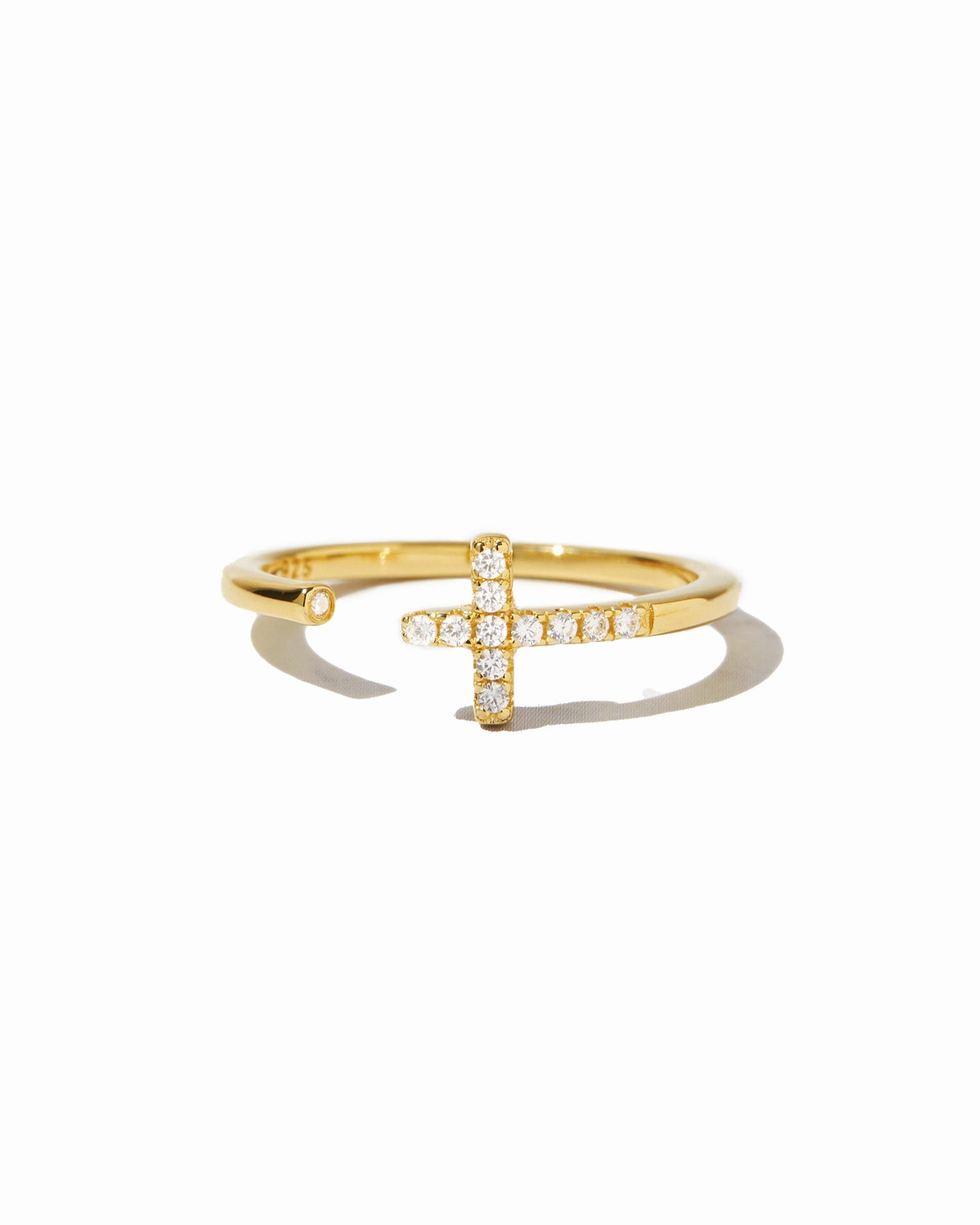 Gold Cross Open Cuff Ring by Sami Jewels featuring a sleek, minimalist design on a white background.