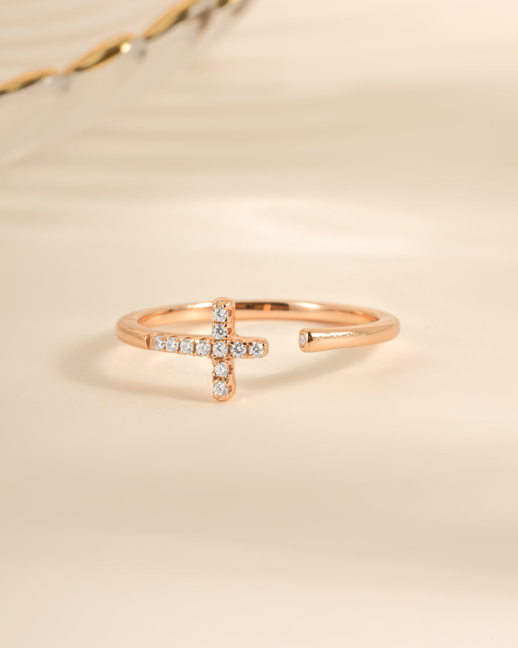 Rose gold Cross Open Cuff Ring by Sami Jewels featuring a sleek, open design with a cross detail on a smooth band.