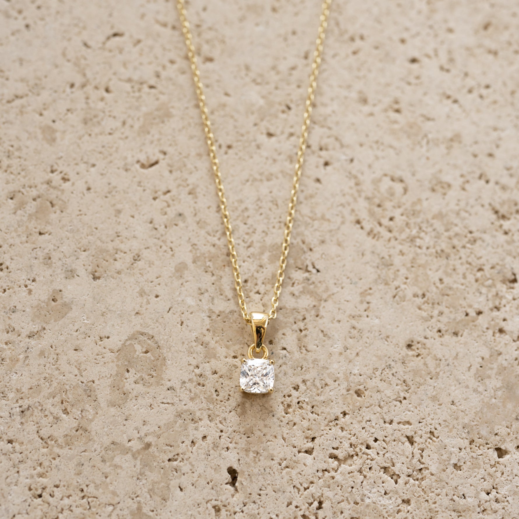 Gold cushion diamond pendant necklace by Sami Jewels, front view showcasing the elegant diamond centerpiece.