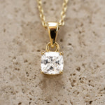 Gold cushion diamond pendant necklace from Sami Jewels, featuring a sparkling diamond centerpiece and elegant chain.